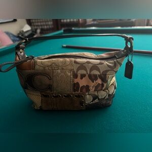 Brown coach mini purse with cheetah print